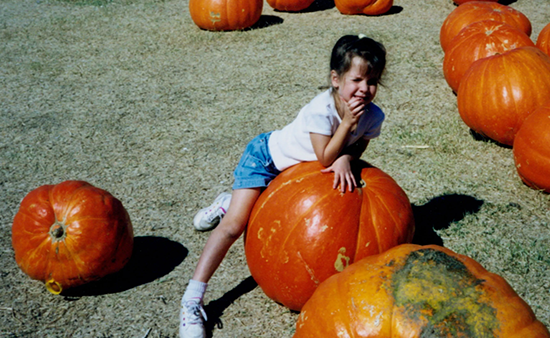 girl with pumpkin image